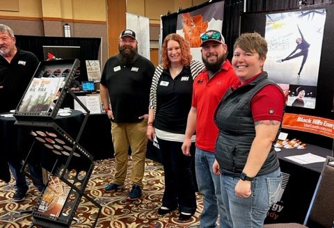 Black Hills home show booth and group of employees