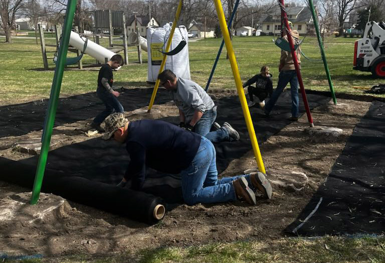 nebraska volunteer of the year installs playground equipment